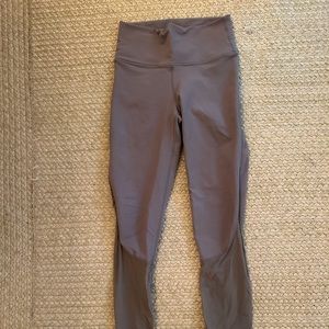 Gray leggings with mesh on the bottom